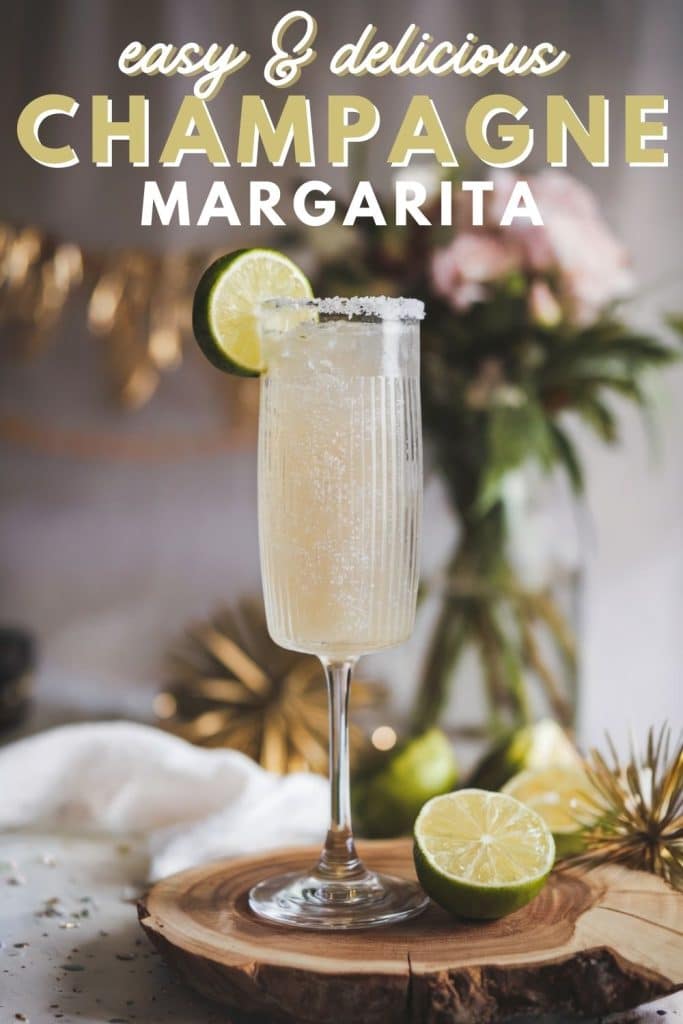 sparkling champagne margarita on a wooden tray next to a lime for a new years eve celebration