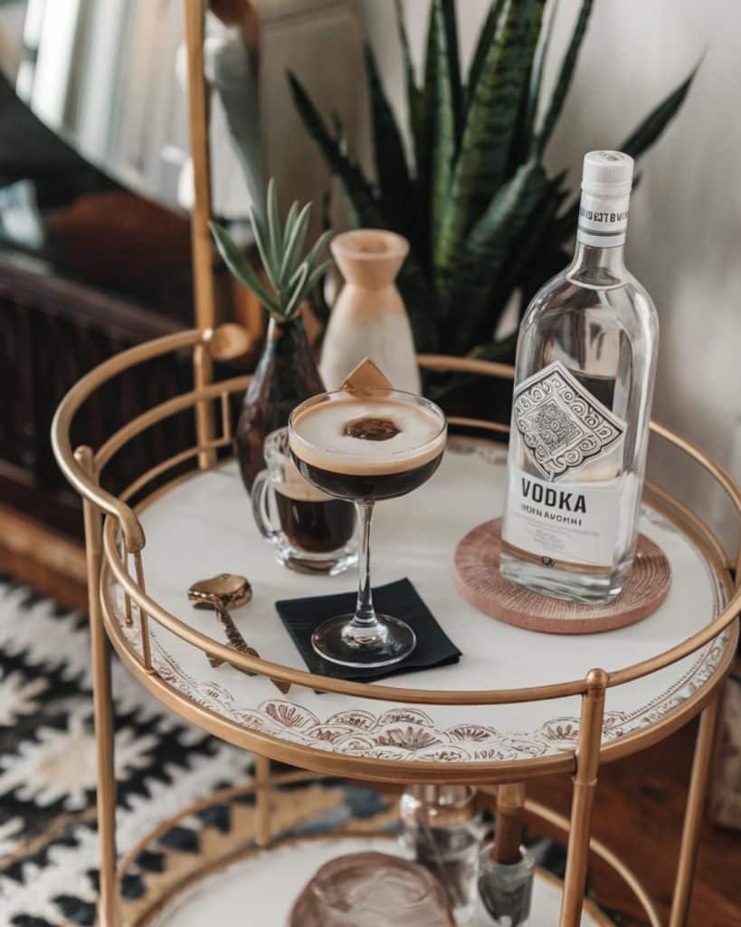 espresso martini on an aesthetic bar car in a girls apartment